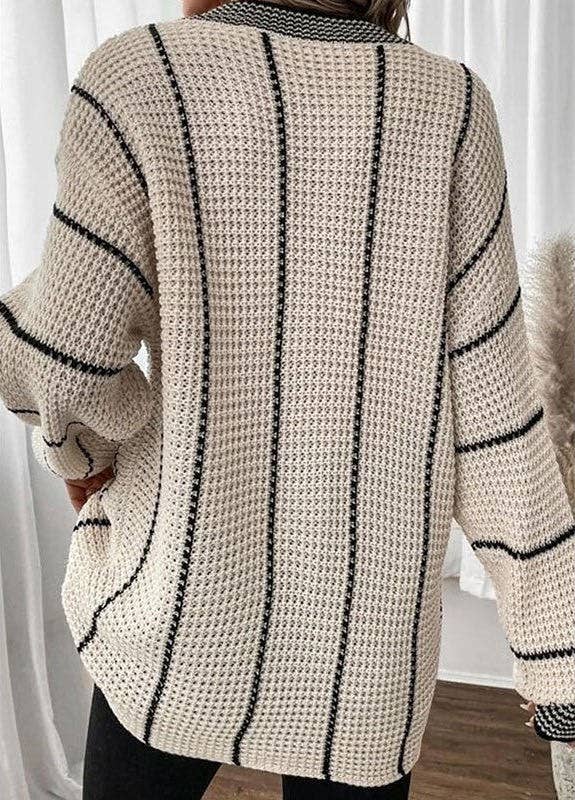 Striped knit sweater: Cream