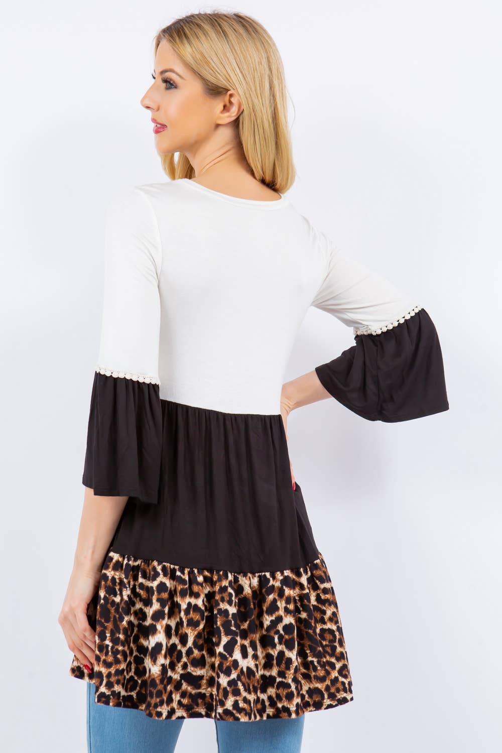 PLUS ANIMAL PRINT TIERED TOP WITH BELL SLEEVES