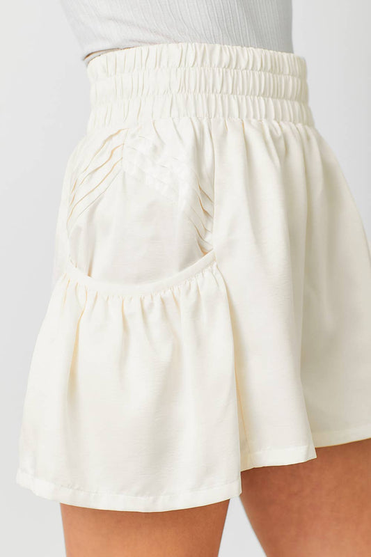 CREAM FLUTTER SHORTS